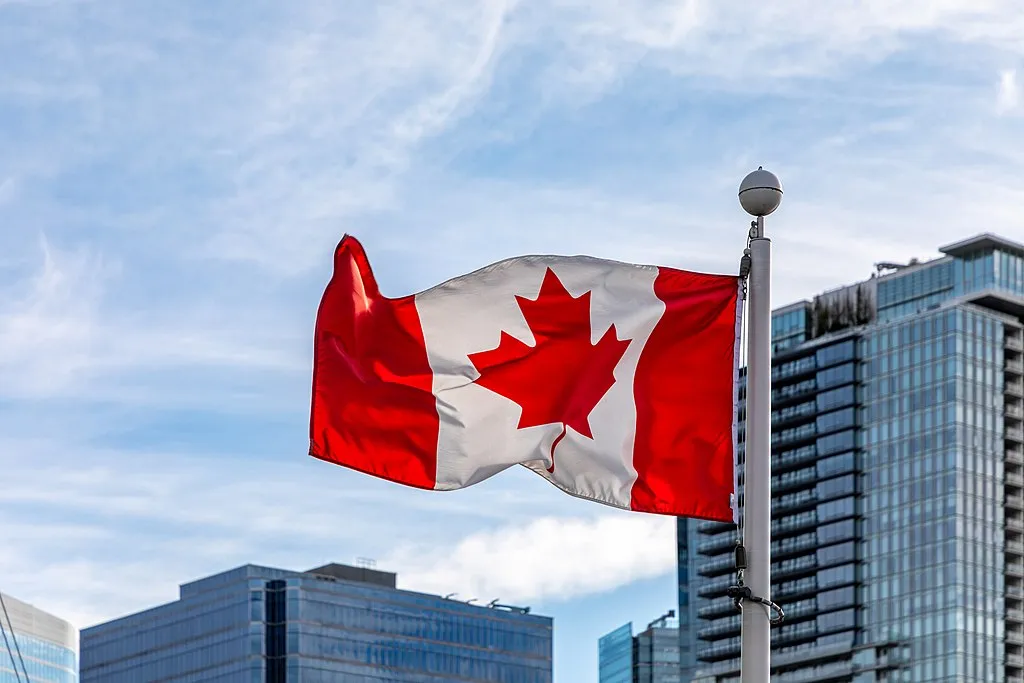 Canada Jobs Surge as US Hiring Slumps, Boosting Bitcoin Outlook
